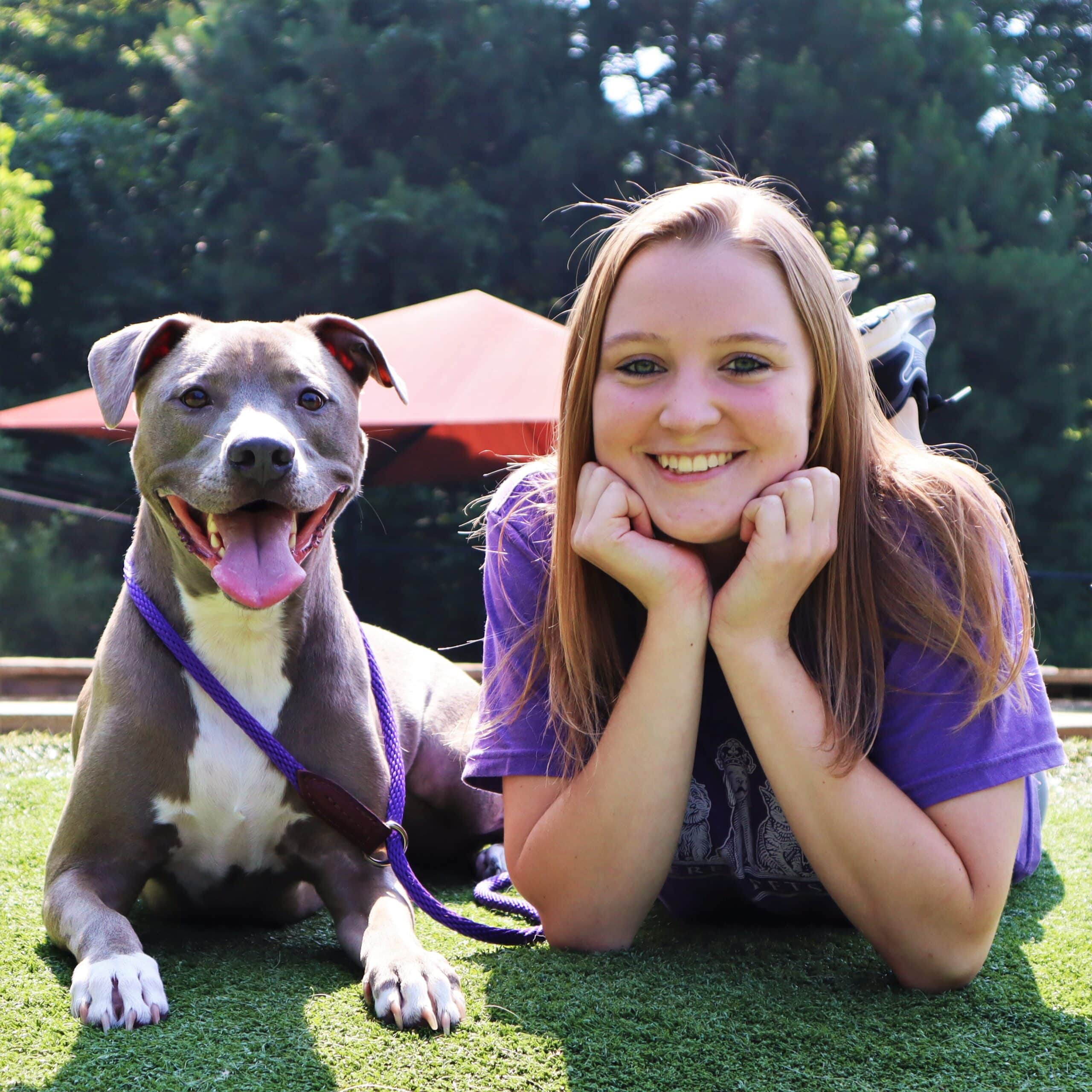 Jenna posing with her dog Luna