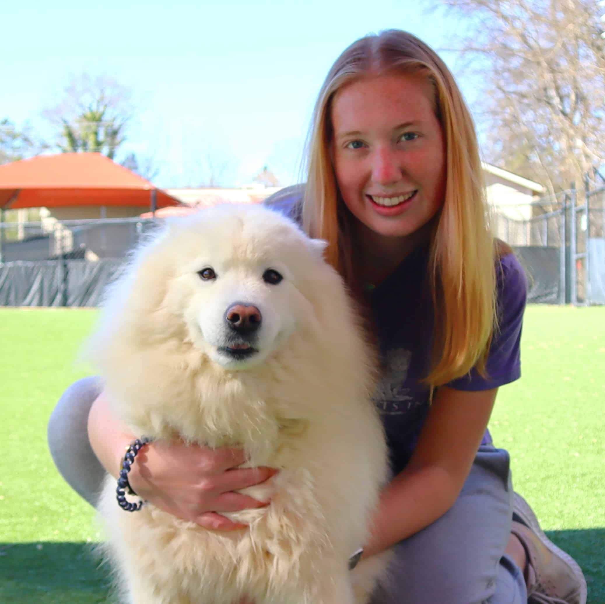 Staff member with pet guest