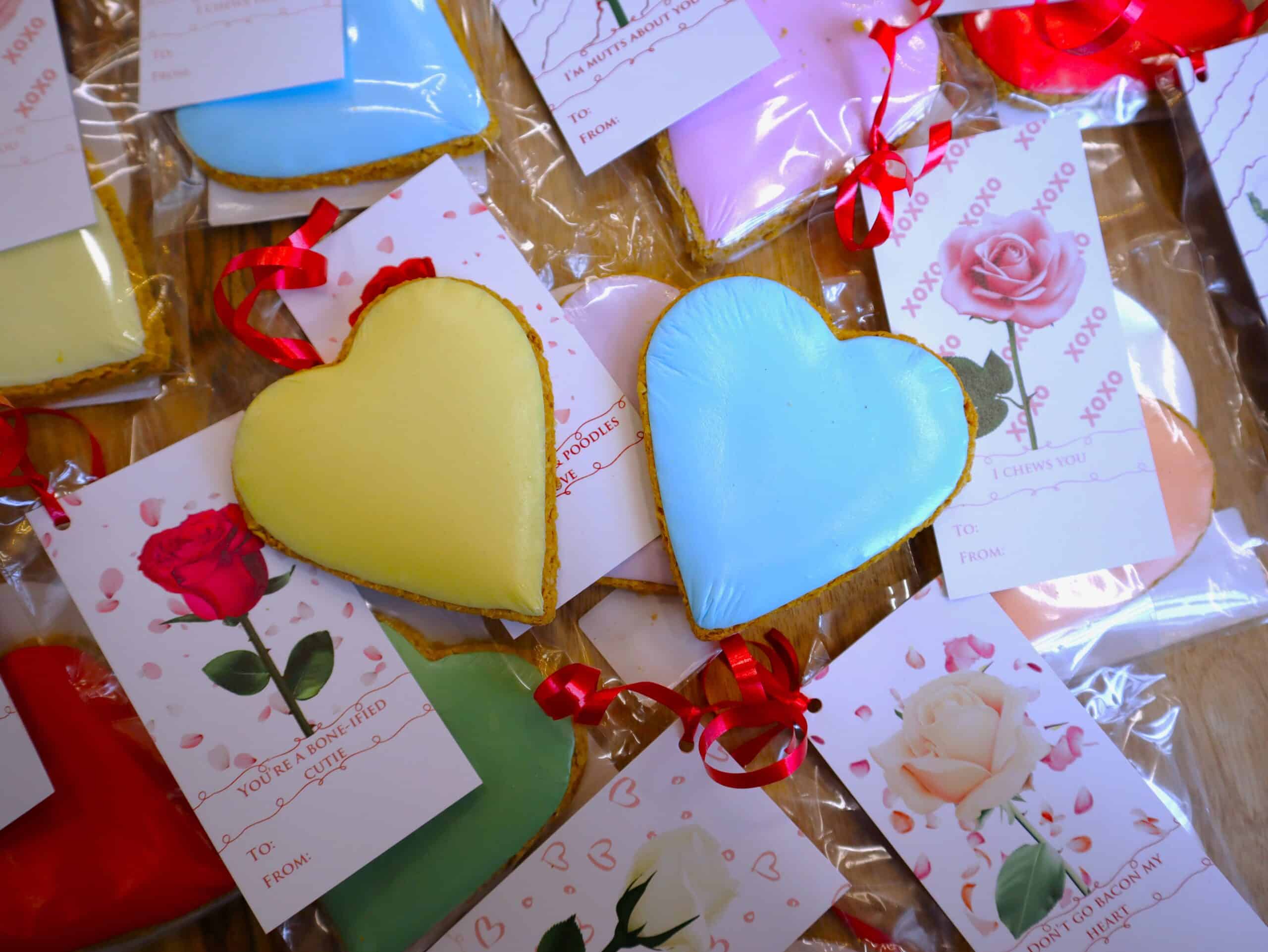 Valentine cookies on top of valentine cards