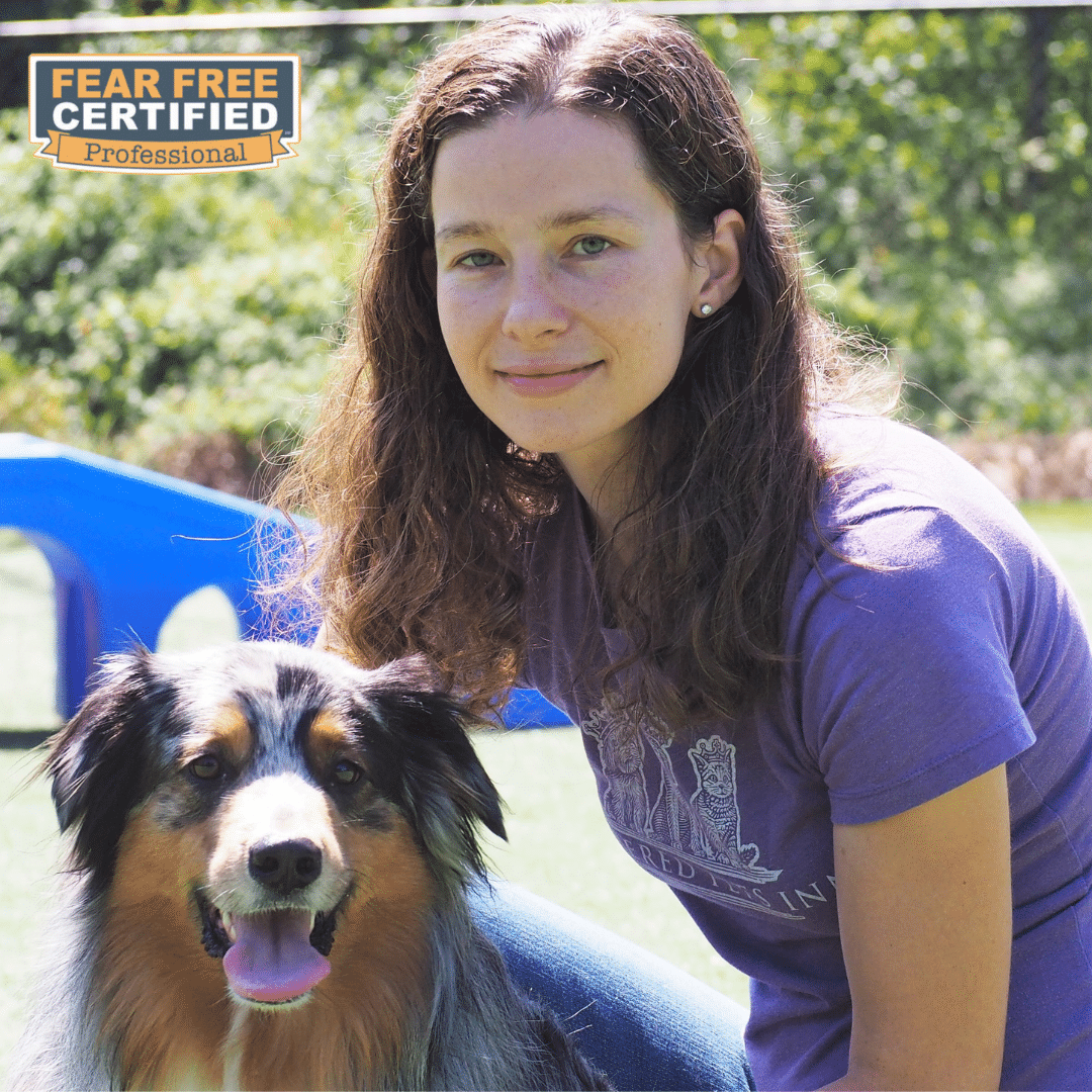 Lodging and Daycare supervisor posing with her dog